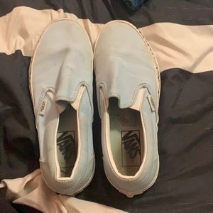 baby blue slip on vans with checkers on sides